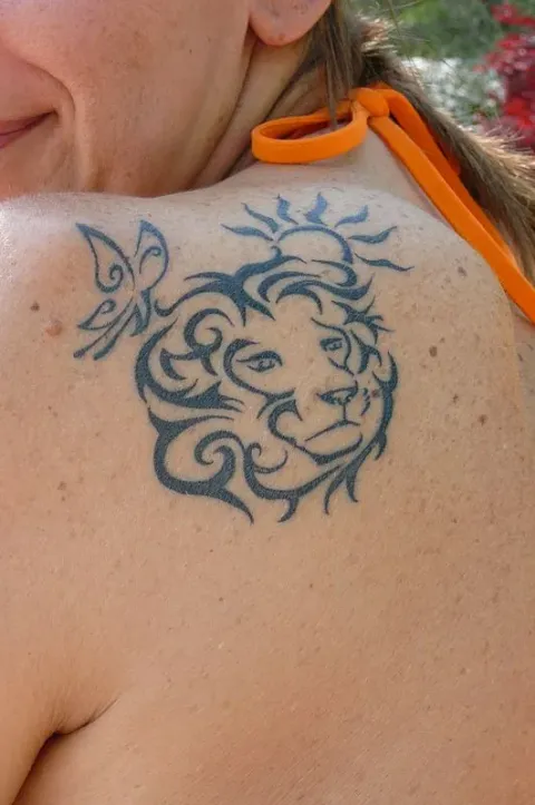 Gabriella - Lion, butterfly, sun