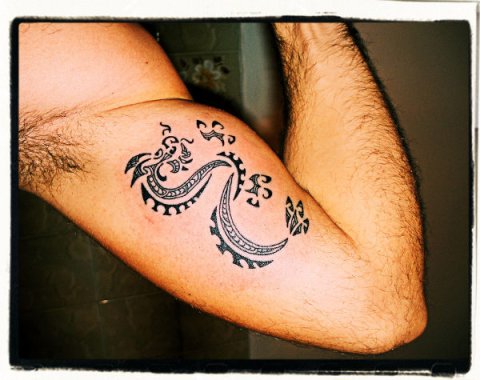 Chris - Maori style dragon: real inked placement tattoo photo thumbnail