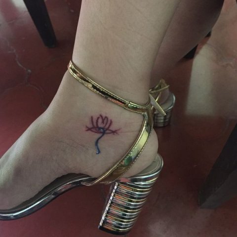 Gracia - M lotus: real inked placement tattoo photo thumbnail