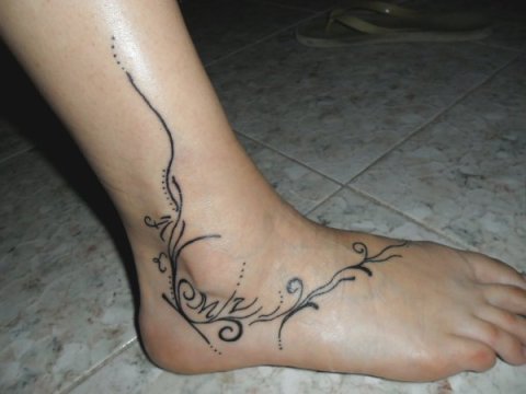 Ivonne - Letters and swirls: real inked placement tattoo photo thumbnail