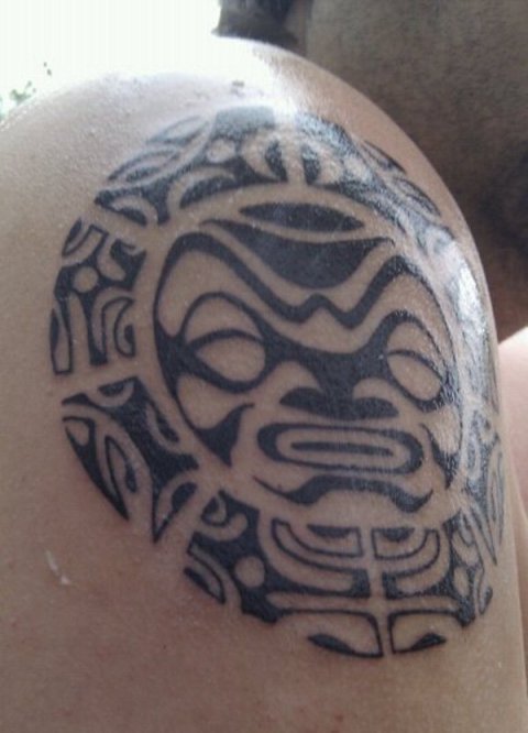 Kris - Polynesian sun: real inked placement tattoo photo thumbnail