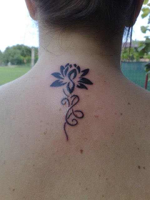 Ombretta - Lotus flower: real inked placement tattoo photo thumbnail