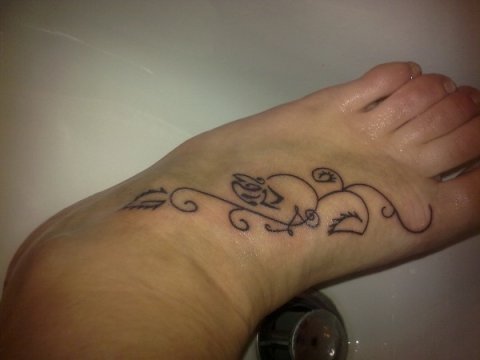 Valentina - Thornless rose: real inked placement tattoo photo thumbnail